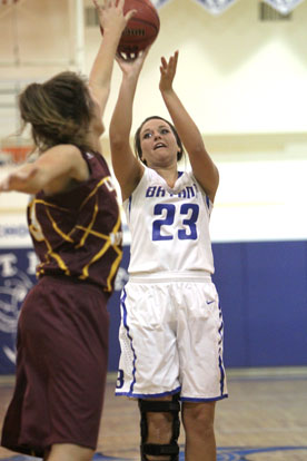 Aubree Allen tries to get a shot over Lake Hamilton's Kori Bullard. (Photo by Rick Nation)