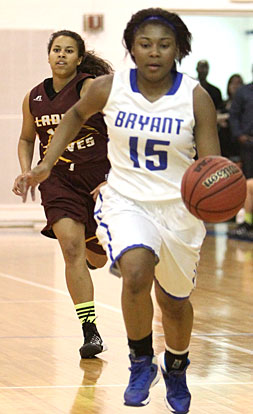 Jayla Anderson pushes the ball up the floor. (Photo by Rick Nation)