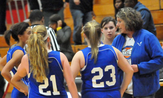 Bethel coach Rhonda Hall instructs her squad during a timeout. (Photo by Kevin Nagle)