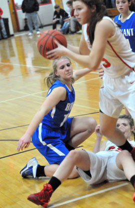 Bryant's Riley Hill starts to get up after a scramble for a loose ball Monday night. (Photo by Kevin Nagle)