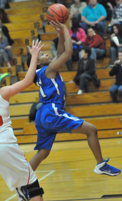 Destiny Martin gets to the basket on a drive through the Cabot South defense. (Photo by Kevin Nagle)