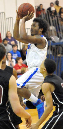 C.J. Rainey pulls up for a jumper in the lane. (Photo by Kevin Nagle)