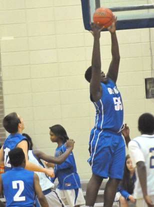 Kaevon Jones hauls down a rebound. (Photo by Kevin Nagle)