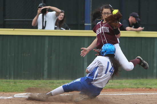 Tori Hernandez slides safely into third under the throw. (Photo by Rick Nation)