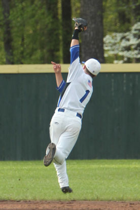Bryant second baseman Korey Thompson chases down a looping liner in shallow center. (Photo by Rick Nation)