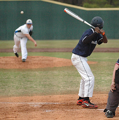 Bryant's Zack Jackson, left, delivers a pitch. (Photo by Kevin Nagle)