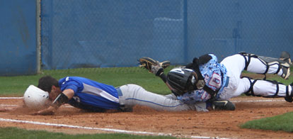 Chase Tucker, left, is bowled over by Southside catcher Mark Clark during the first inning of Saturday's game. (Photo by Rick Nation)