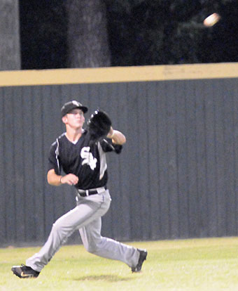 Drew Tipton locks onto a drive to left. (Photo by Kevin Nagle)