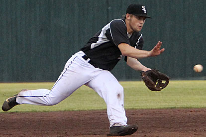 Trevor Ezell makes a play at short. (Photo by Rick Nation)