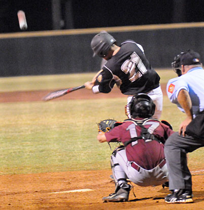 Blake Patterson (21) rips a pitch to right. (Photo by Kevin Nagle)