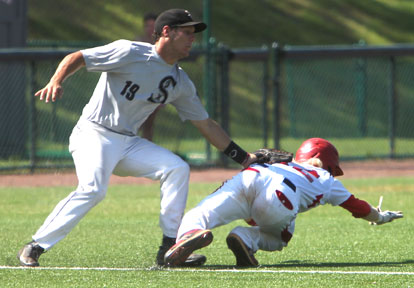 Bryant third baseman Brandan Warner tags out Columbia, Tenn., base-runner Hayden Holt during the third inning of Monday's second game. (Photo by Rick Nation)