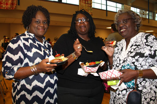 From left, Rosalind Reams, Marilyn Jackson, Sarah Vinson enjoy food, friends, and fun at the 2014 Taste of Bryant. (Photo by Rick Nation)
