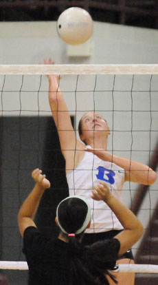 Britney Sahlmann goes up for a hit during a team camp match at Benton recently. (Photo by Kevin Nagle)