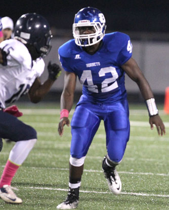 Demaja Price sets his sites on a defender to block. (Photo by Rick Nation)