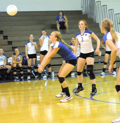 Whitney Brown and Nikki Clay (3) play the back row. (Photo by Kevin Nagle)