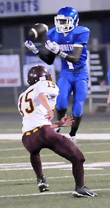 Jakalon Pittman leaps up for a pass reception he turned into a touchdown. (PHoto by Kevin Nagle)