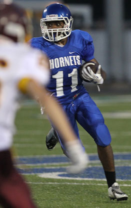 Diante Woodson rushed for 132 yards on 14 carries. (Photo by Rick Nation)