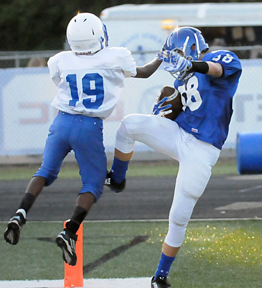 Logan Grant (88) caught a pair of touchdown passes but he was ruled out of bounds on this catch in the back of the end zone. Lakewood's Amaad Yancey defends. (Photo by Kevin Nagle)