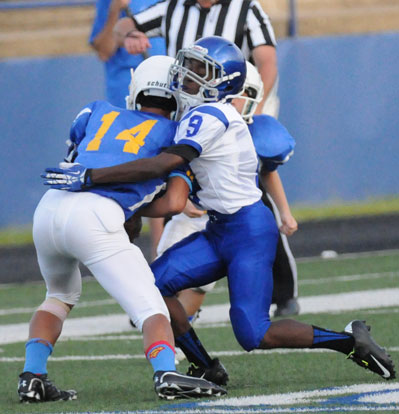 Bethel's Sebastian Dunn makes a tackle. (Photo by Kevin Nagle)