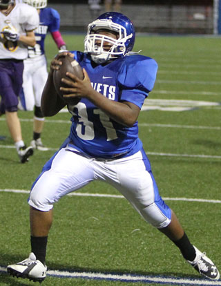 Kris King makes a late game-clinching interception. (PHoto by Rick Nation)