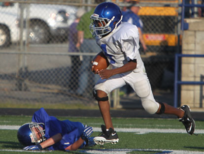 Bryant White quarterback Derrick Rose heads upfield on a long run. (Photo by Rick Nation)