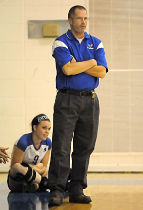 Bryant coach Lawrence Jefferson watches the action with junior Kendall Selig. (Photo by Kevin Nagle)