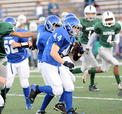 Alex White (44) returns a kickoff. (Photo by Kevin Nagle)