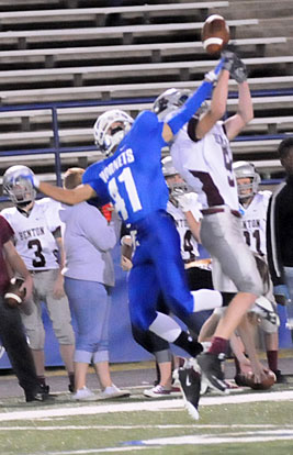 Bryant's Dalton Long (41) battles for a pass. (Photo by Kevin Nagle)