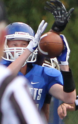 Luke Curtis looks in a pass on a successful two-point conversion. (Photo by Rick Nation)