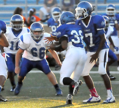 Dalton Winkler (66) sets up to make a tackle. (Photo by Kevin Nagle)