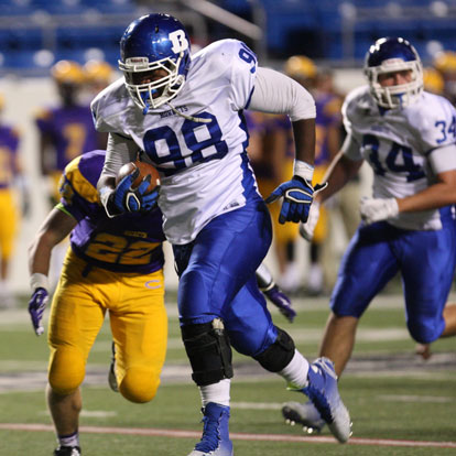 Bryant defensive tackle Cameron Murray sprints toward the end zone after scooping up a fumble. (Photo by Rick Nation)