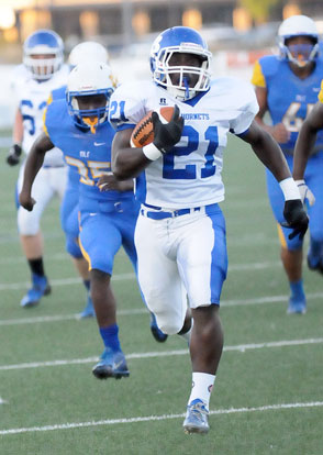 Bryant's Cameron Coleman (21) breaks a long run with North Little Rock defenders left in his wake. (Photo by Kevin Nagle)