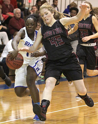 Lauren Carroll (11) steals the ball from Benton's Bayley Landreth (45). (Photo by Rick Nation)