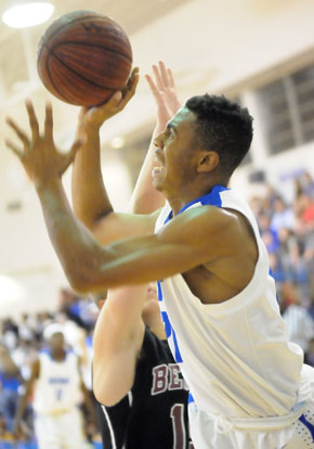 Romen Martin struggles to get a clean shot. (Photo by Kevin Nagle)