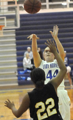 Stephanie Cullen puts up a shot over a Hot Springs defender. (Photo by Kevin Nagle)