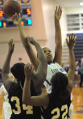 Raven Loveless (25) finished with 7 points and 10 rebounds. (Photo by Kevin Nagle)