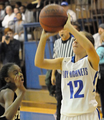 Kelly Williams eyes the bucket. (Photo by Kevin Nagle)