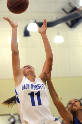 Danielle Singleton puts up a shot. (Photo by Kevin Nagle)