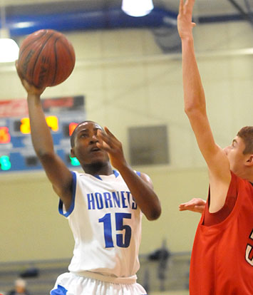 Malcolm Moody looks to get a shot away. (Photo by Kevin Nagle)