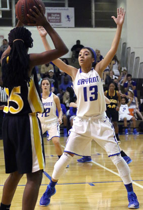 Raija Todd (13) and Maddie Baxter (12) guard an inbounds play. (Photo by Rick Nation)