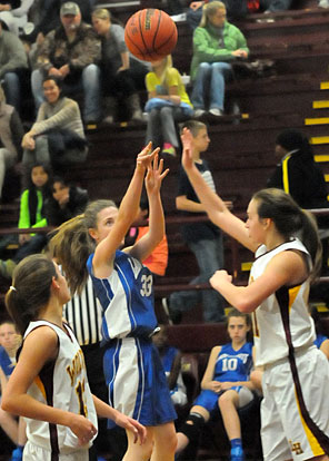 Meagan Chism shoots over a Lake Hamilton defender. (Photo by Kevin Nagle)