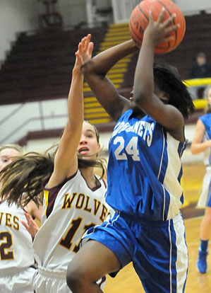 Kalia Walker finishes off a drive. (Photo by Kevin Nagle)