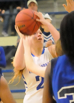 Baylee Rowton looks for an opening inside against Conway White. (Photo by Kevin Nagle)