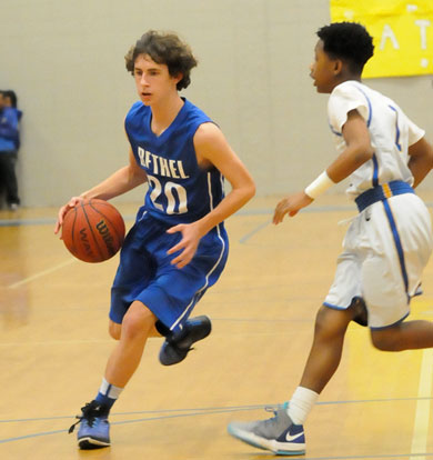 Chris Fuller (20) finds a seam in the Ridge Road defense. (Photo by Kevin Nagle)