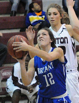 Maddie Baxter (12) looks to score in a crowd. (Photo by Kevin Nagle)