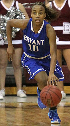 Jakeria Otey pushes the ball up the floor. (Photo by Rick Nation)