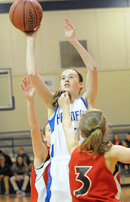 Mary Catherine Selig reaches hit to get a shot away. (Photo by Kevin Nagle)