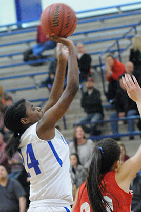 Jasmine Daniels (24) contributed a key basket in the fourth quarter. (Photo by Kevin Nagle)