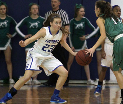 Kendall Rogers (23) defends against Van Buren's Jamilynn Kinney. (Photo by Rick Nation)