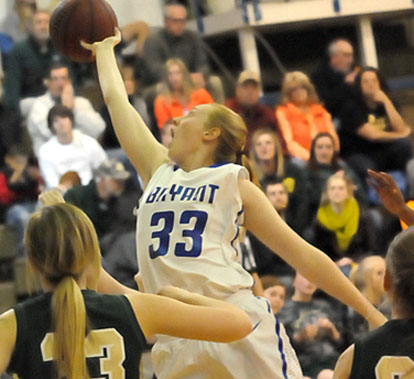Rachel Miller reaches for a rebound. (Photo by Kevin Nagle)